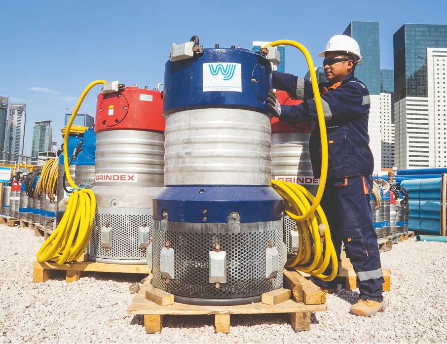 Sump Pumping - Engineer busy with sump pumping pump